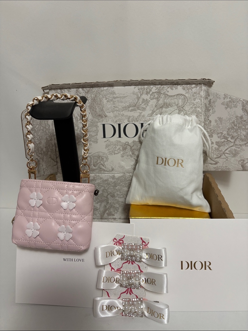 Dior Pink Quilted Mini Bag with Gold Chain Strap and Floral Appliqués